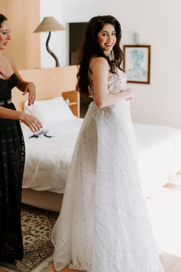 Lace bodice over a full tulle skirt, photographed outdoors