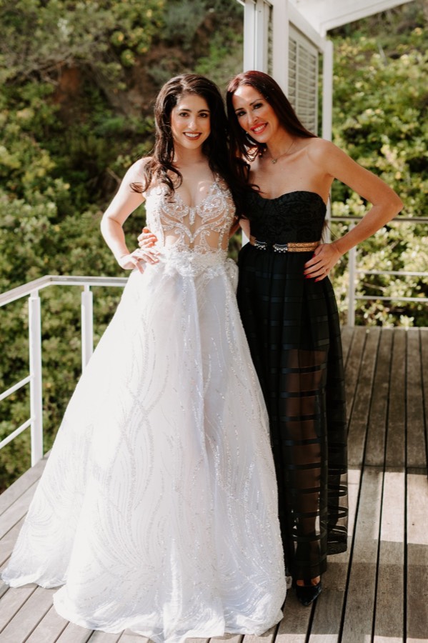 Contemporary bridal look in black and tulle for a reception change