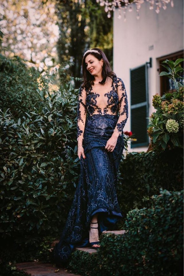 Navy lace evening gown with an illusion bodice, photographed outdoors