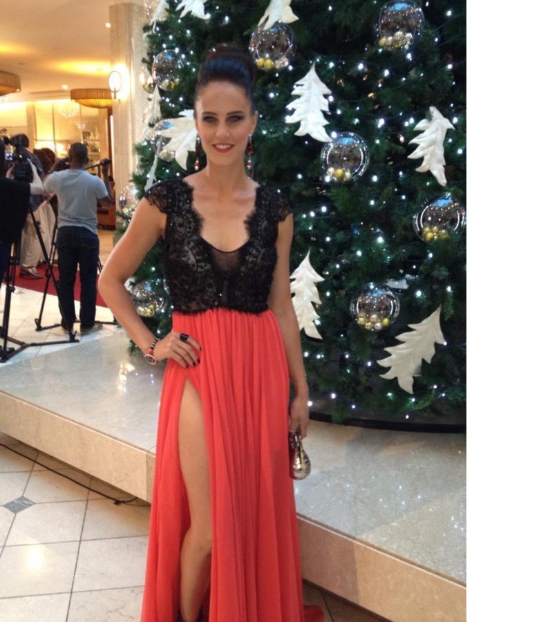 Black lace bodice with a red skirt, festive evening look
