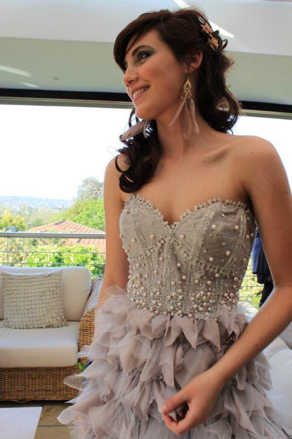 Nude beaded sweetheart bodice with a sculpted tulle skirt