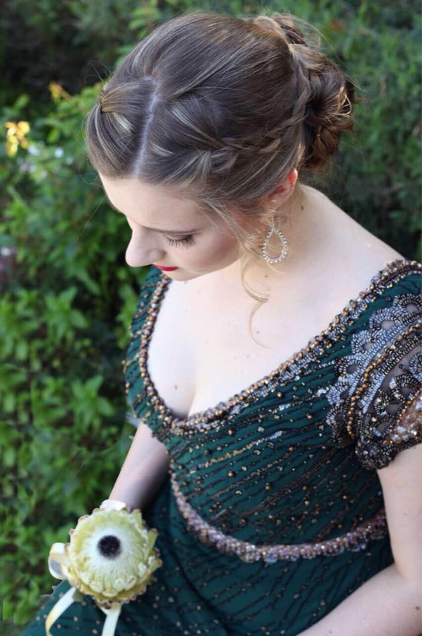 Dark green beaded bodice, close detail of the hand-set stones